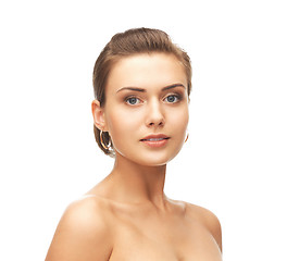 Image showing beautiful woman wearing gold earrings