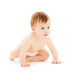 Image showing crawling curious baby