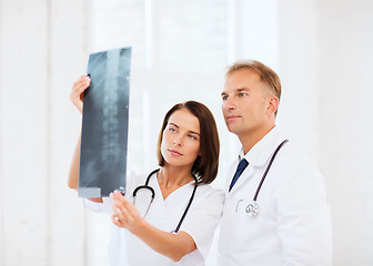 Image showing two doctors looking at x-ray