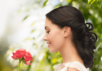 Image showing young woman with flower