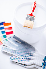 Image showing paintbrush, paint pot, gloves and pantone samples