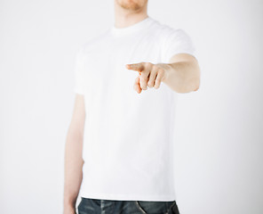 Image showing man pointing his finger at you