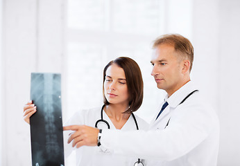 Image showing two doctors looking at x-ray