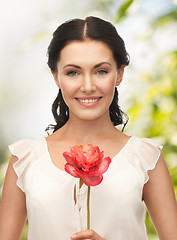 Image showing young woman with flower