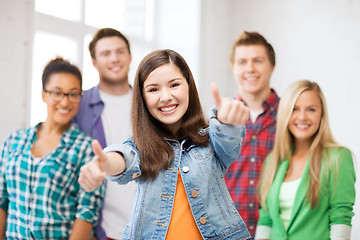 Image showing students showing thumbs up at school