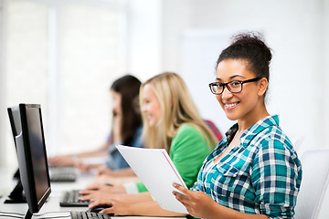 Image showing african student with computer studying at school