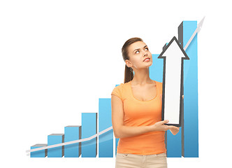 Image showing woman with rising graph and arrow directing up