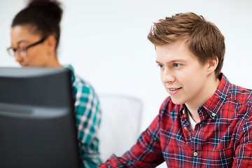 Image showing student with computer studying at school