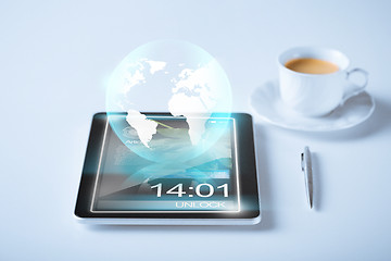 Image showing tablet pc with sign of globe