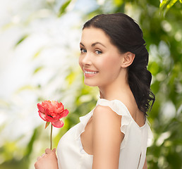 Image showing young woman with flower