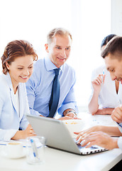 Image showing businessman with team on meeting in office