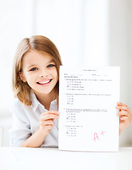 Image showing girl with test and grade at school