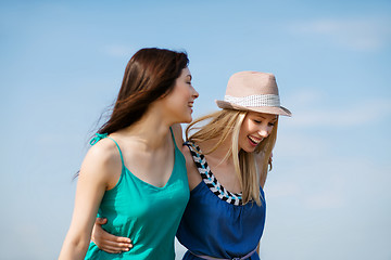 Image showing girls walking on the beach