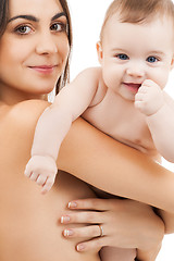 Image showing happy mother with adorable baby