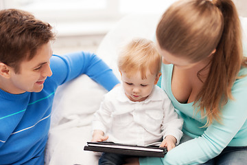 Image showing parents and adorable baby with tablet pc