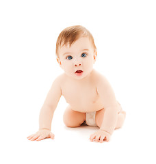 Image showing crawling curious baby