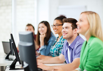 Image showing students with computers studying at school