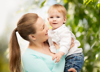 Image showing happy mother with adorable child