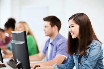 Image showing students with computers studying at school