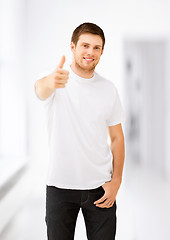 Image showing man showing thumbs up