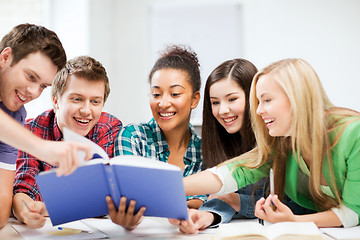 Image showing students reading book at school