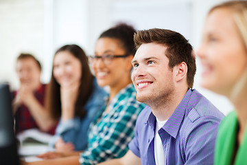 Image showing students with computers studying at school