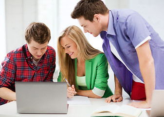 Image showing students writing test or exam in lecture at school