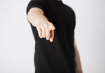 Image showing man pointing his finger at you