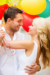 Image showing couple with colorful balloons