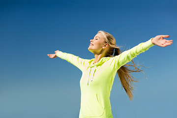 Image showing woman doing sports outdoors