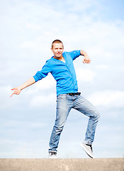 Image showing handsome boy making dance move