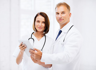 Image showing two doctors looking at tablet pc