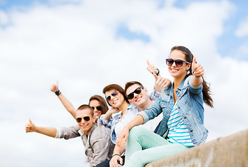 Image showing teenagers showing thumbs up