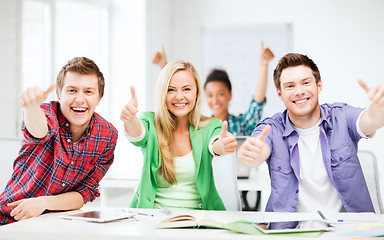 Image showing students showing thumbs up at school