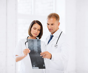 Image showing two doctors looking at x-ray