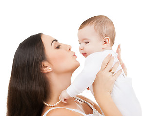Image showing happy mother kissing her child