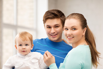 Image showing happy family with adorable baby