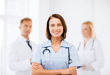 Image showing young female doctor with stethoscope