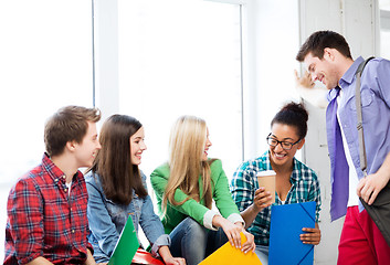 Image showing students communicating and laughing at school