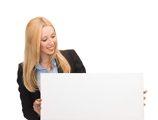 Image showing businesswoman with white blank board