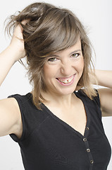 Image showing real nice young woman in funny expression