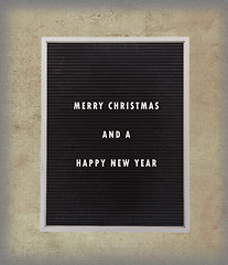 Image showing Christmas message in plastic letters on very old menu board