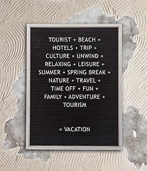 Image showing Vacation concept in plastic letters on very old menu board