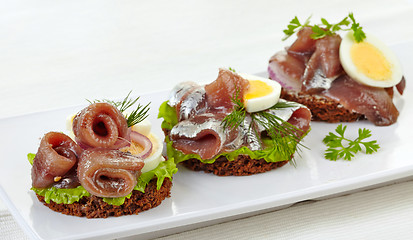 Image showing canapes with anchovies and egg