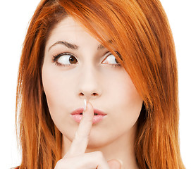 Image showing woman with finger on her lips