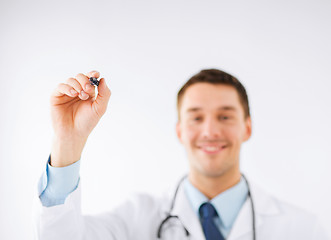 Image showing doctor writing something in the air