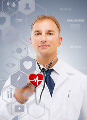 Image showing male doctor with stethoscope and virtual screen