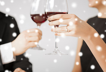 Image showing engaged couple with wine glasses