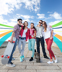 Image showing teenagers with skates outside