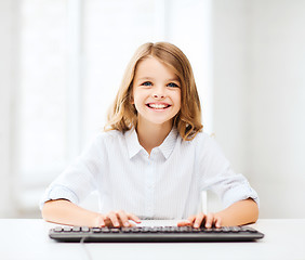 Image showing student girl with keyboard